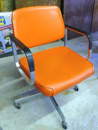 Swivel office chair that rolls easily. Seat approx. 20" wide. Upholstery needs some work.