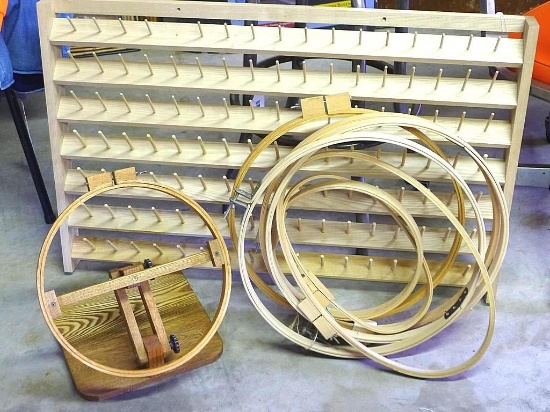 Beautiful handmade wooden spool rack, table top hoop stand and various hoops. Rack is 37-1/2" x 24".