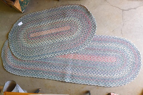 Two beautiful braided rugs. Longer rug is 23-1/2" w x 71" l. Both are in good shape.