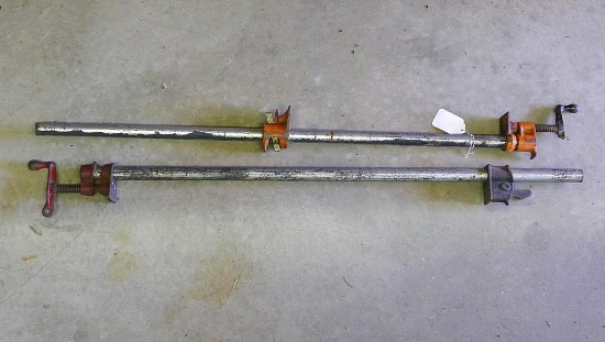 Two pipe clamps, one is a Pony. Pipes are 3/4" x 40" long. Appear in good shape.