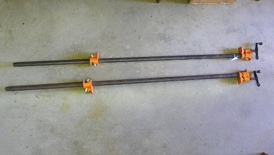 Two Pony pipe clamps. Pipes are 3/4" x 5' long. Appear in good shape.