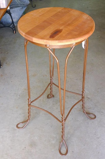 Lovely plant stand with wooden top. Approx. 14" w x 27" h.
