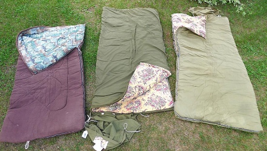 Three sleeping bags incl. two Coleman bags with flannel linings and one other. All the zippers work.