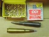 Military .50 BMG round, head stamped FA 38 CAL 50; reloaded .50 BMG round with silver tip bullet;