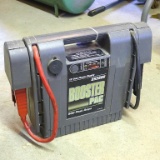 Booster Pac ES2500 starting booster and 12 volt power supply. Comes with charger, untested.