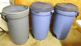 Three Rubbermaid garage cans with two lids. Approx. 21-1/2
