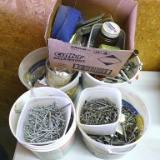 Assorted screws, bolts, nails, hardware and supplies as pictured.