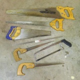 Assortment of hand saws, longest is 29