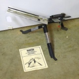 Outers Fightmaster Jr. trap thrower with instruction manual. Thrower measures approx. 28