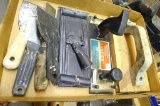 Assortment of putty knives, sheetrock sander and more.