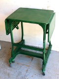 Vintage typewriter stand with fold down sides. Overall measures 35-1/2