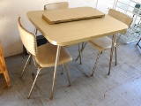 Vintage table with 3 matching chairs and one leaf. Table is 29-1/2