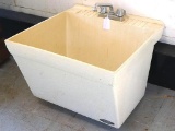 Nice Utility sink with faucet. Sink is 23
