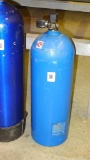 Aluminum scuba tank, 63 cu. inch capacity, has been emptied to allow shipping. Approx. 25