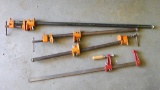 Three Pony pipe clamps, up to 3' and one other clamp.