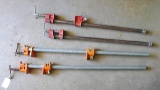 Four pipe clamps includes two Pony pipe clamps, 1/2