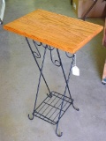 Cute stand with wooden top. Measures 11-1/2