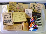 Assorted stamps, ink pads, color pencils and more. Container is 16