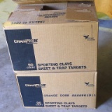 One full and one partial box of Champion sporting clays skeet & trap targets. Full box contains 90.