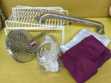 Two shower curtains, grab bar, rain shower head, another shower head and some wire shelving. Each