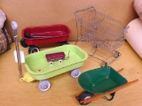 Kids shopping cart, wheelbarrow, and three wagons. Red wagon 7-1/2