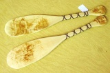 Two decorative paddles made in Wisconsin. Each paddle is 24