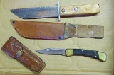 Buck No. 110X USA lock back knife with belt pouch, one handle slab has a tight crack and loose