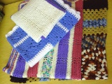 Three handmade crochet throws. Largest one approx. 48
