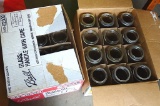 Two dozen regular quart size canning jars. One box is new and includes rings and lids. Just in time