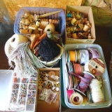 Nice assortment of craft items incl. wooden spools of thread, ribbon, eyes, leather fringe and more.