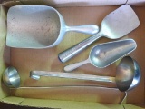 Two Vollrath ladles, Zeroll scoop, two other scoops. All in nice condition.
