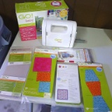 Go! Baby fabric cutter by AccuQuilt, plus a few cutting mats and dies