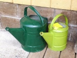 Two painted galvanized watering can. Numbered 8 & 16. Both are missing sprinkler head.