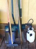 Backsaver snow shovel, edger, rake, flat bottom shovel and another shovel.