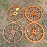 Four wooden wheels, 23-1/2