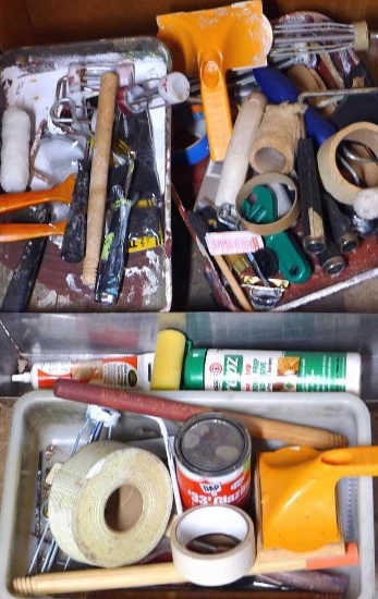 Assortment of painting and wall repair tools and supplies.