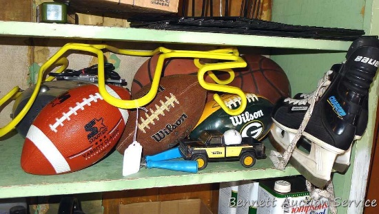 Assortment of sporting goods and radio. Includes footballs, hockey skates (size 6), basketball, more