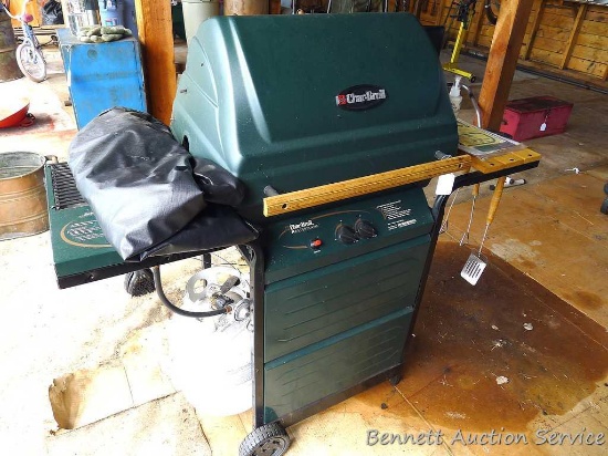 Char Broil Master Flame gas grill, model 4637012. Comes with vinyl cover, side burner, grill tools,