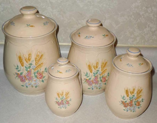 Floral and wheat canister set. Tallest canister is 10-1/2" tall with lid.
