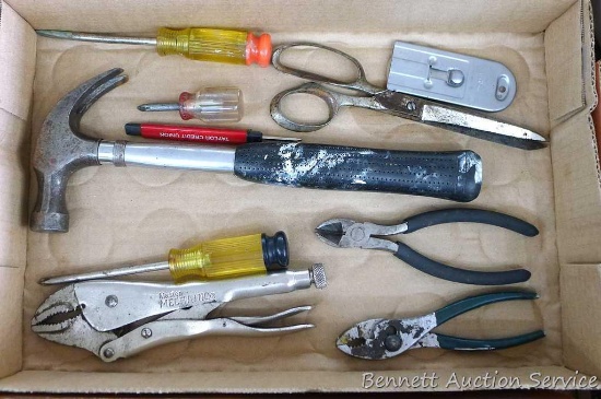 Assortment of Phillips screwdrivers, metal handle claw hammer, adjustable locking pliers, more.