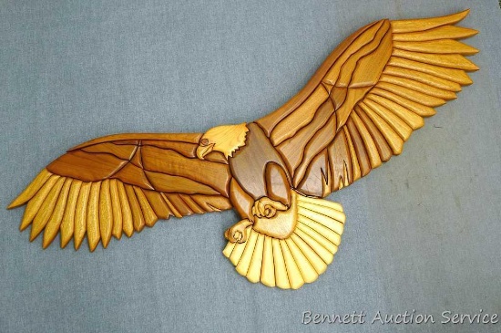Beautiful wooden eagle, made with combination of wood, created by Shirley Wagner. Approx. 50" x 24".