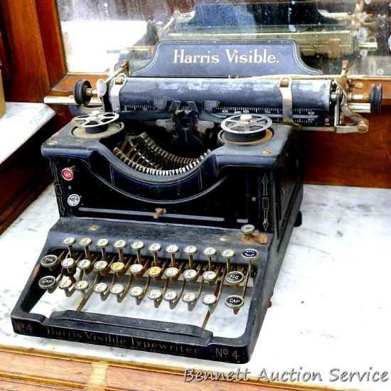 Antique Harris Visible typewriter No. 4 is 17" x 14" x 9" tall was donated by De-Mon Racing.