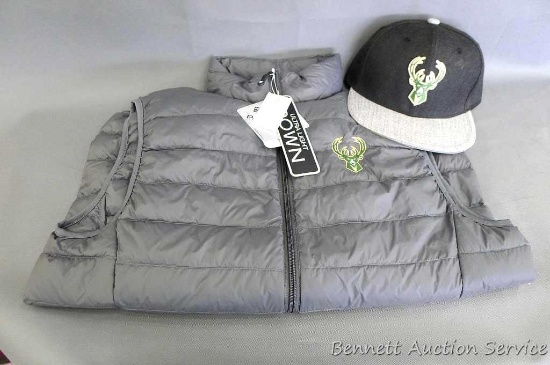 Ultra light down vest is packable, weather proof 32 degrees heat, size M/M; and Milwaukee Bucks cap