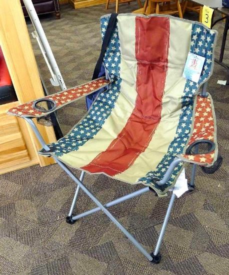 Oversized Patriotic bag chair, 300 lbs. weight capacity, 34" x 23" wide x 37" tall. Appears new.