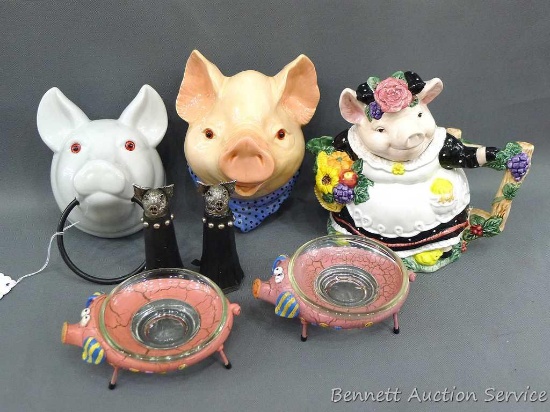 Assortment of ceramic pigs including wall pocket, teapot, cute dishes, salt and pepper shakers, and