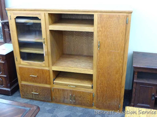 Oak storage cabinet could be made into a child's kitchenette, has shelving and drawers, shows some