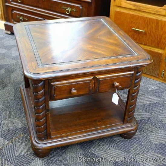 Wooden end table 28" is x 28" x 24' tall, have some nicks and scratches and are donated by Andrea &