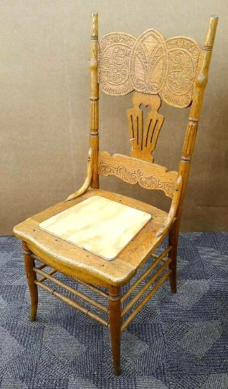 Antique oak pressed back chair needs new caning, is 18" x 42" tall x 16" and was donated by Heidi