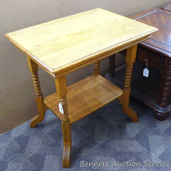 Beautiful oak side table with shelf has a nicely repaired crack, is 29-1/2" x 22" x 31" tall and was