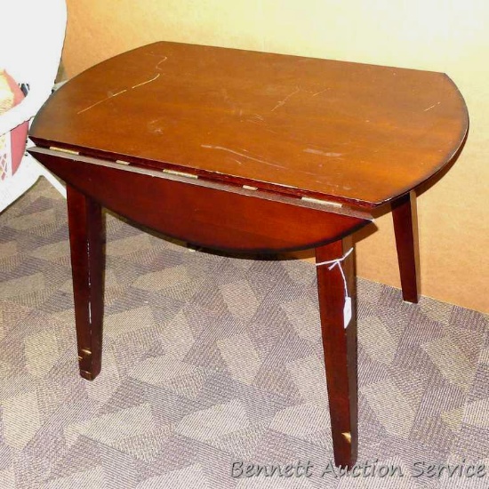 Nice wooden drop leaf table is 40" x 40" x 31" with leaves up, is sturdy, has a missing bracket to